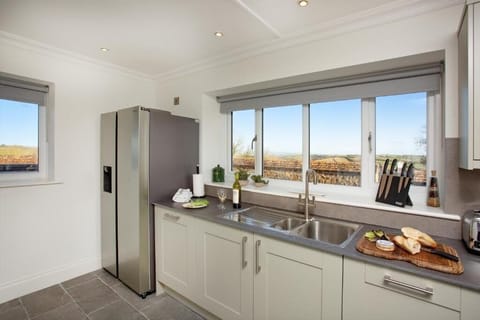 Standard Cottage, 3 Bedrooms | Private kitchen | Coffee/tea maker, electric kettle, highchair