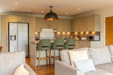 Four Bedroom Lodge | Private kitchen | Coffee/tea maker, electric kettle, highchair