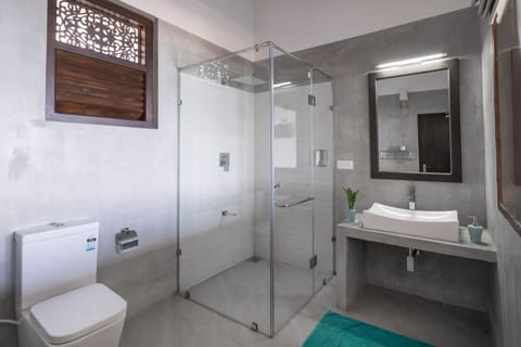 Room, 1 King Bed, Sea View | Bathroom | Shower, rainfall showerhead, towels