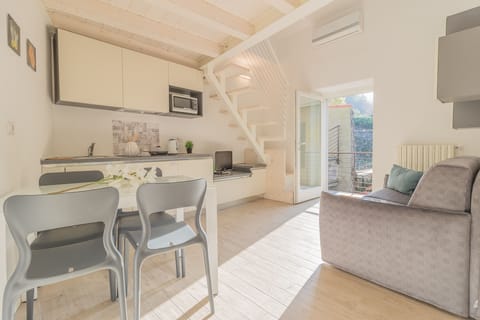 Apartment, 1 Bedroom | Living area | TV