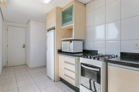 Standard Apartment, Multiple Beds | Private kitchen | Fridge, microwave, cookware/dishes/utensils