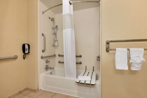 Combined shower/tub, designer toiletries, hair dryer, towels