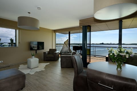 Apartment (Type I) | Living area | Flat-screen TV, DVD player