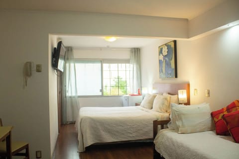 Standard Quadruple Room | Minibar, in-room safe, free WiFi, bed sheets