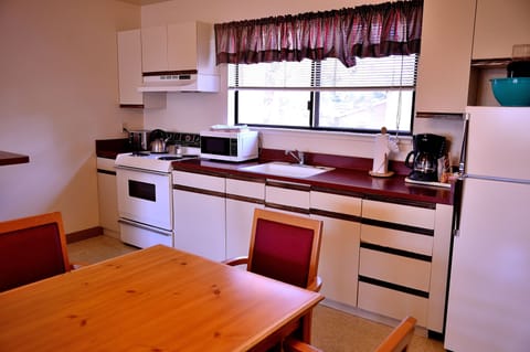 Family Suite, 1 Bedroom | Private kitchen | Fridge, microwave