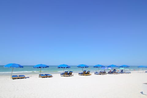 On the beach, white sand, beach towels