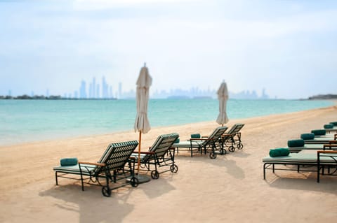 Private beach, white sand, beach cabanas, sun loungers