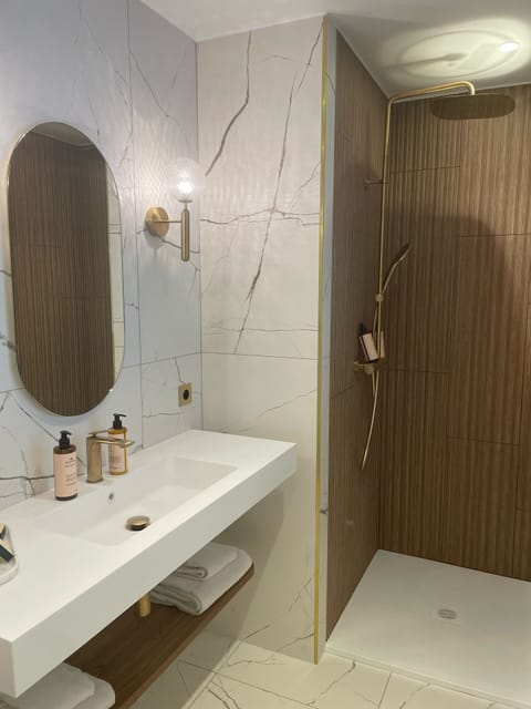 Hair dryer, slippers, towels, soap