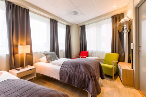 Basic Double or Twin Room | 1 bedroom, iron/ironing board, cribs/infant beds, rollaway beds