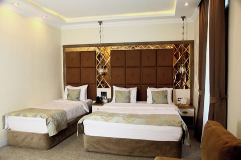 Family Triple Room | Premium bedding, pillowtop beds, minibar, in-room safe