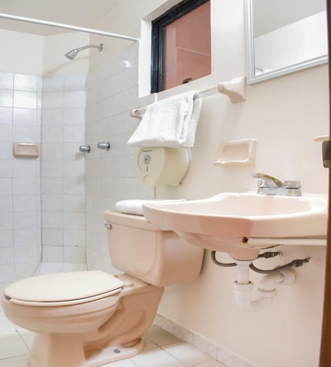 Standard Room, 2 Double Beds | Bathroom | Shower, free toiletries, towels, soap