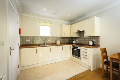 Apartment, 2 Double Beds (Skyhill) | Private kitchen | Full-size fridge, microwave, stovetop, dishwasher