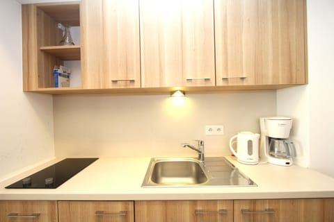 Standard Studio Suite, Ground Floor | Private kitchenette | Fridge, stovetop, cookware/dishes/utensils