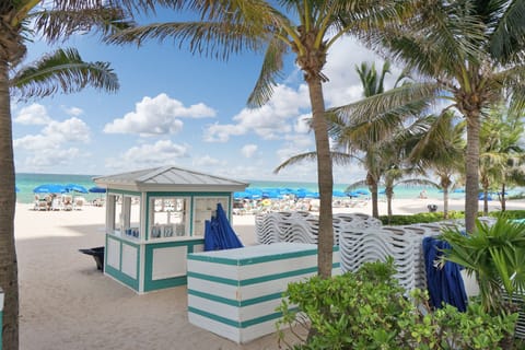 On the beach, sun loungers, beach umbrellas, beach towels