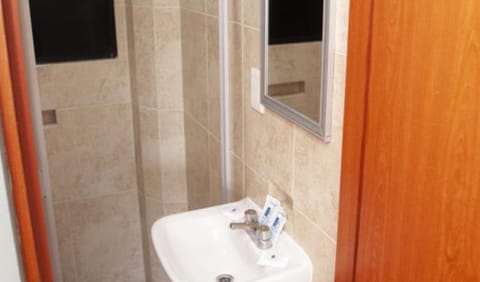 Double Room | Bathroom | Shower, free toiletries, towels, soap