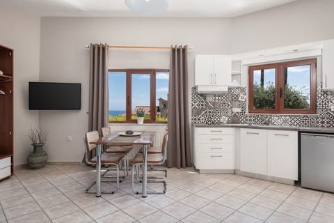 Studio, Sea View | Private kitchenette | Fridge, stovetop, coffee/tea maker, electric kettle