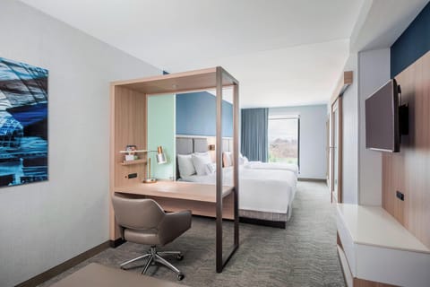 Suite, Multiple Beds | Desk, laptop workspace, blackout drapes, iron/ironing board