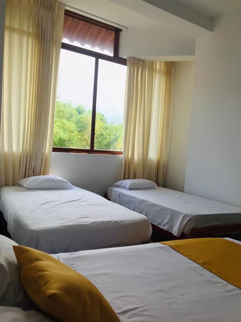 Family Triple Room, Multiple Beds (Air Conditioner) | Minibar, in-room safe, free WiFi, bed sheets