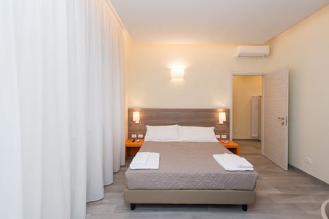 Standard Double Room, Private Bathroom | Minibar, in-room safe, individually furnished, desk