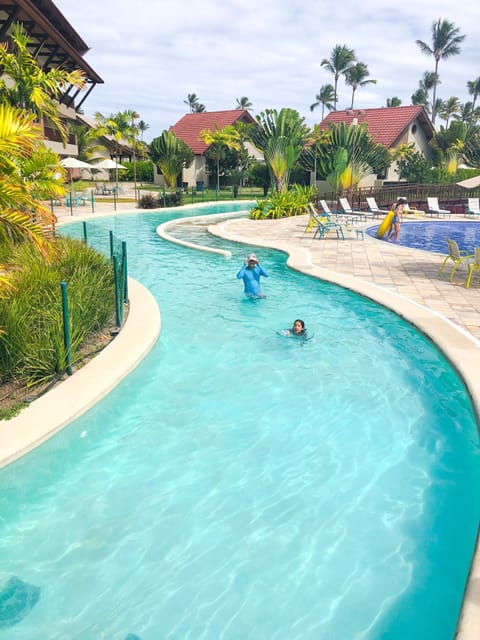 5 outdoor pools, open 8:00 AM to 9:00 PM, pool umbrellas, sun loungers