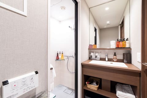 Moderate Double Room, Shower Booth, Non Smoking (Housekeep once every 3 days) | Bathroom | Free toiletries, hair dryer, slippers, electronic bidet