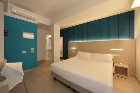 Double or Twin Room, Balcony, Partial Lake View | Minibar, in-room safe, desk, laptop workspace