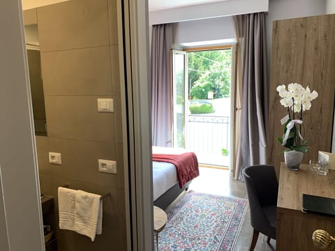 Classic Room, Balcony | Minibar, in-room safe, desk, soundproofing