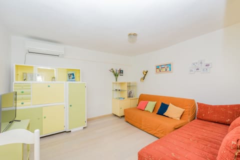 Apartment, 1 Bedroom | Living area | Flat-screen TV