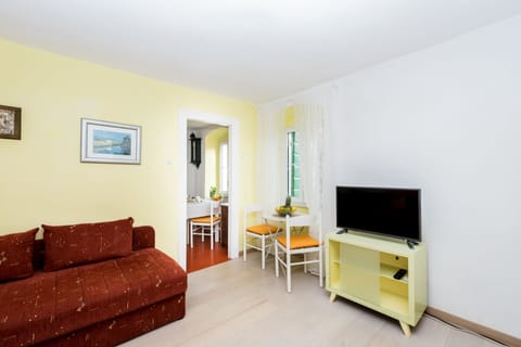 Apartment, 1 Bedroom | Living area | Flat-screen TV