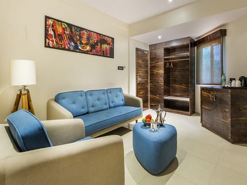 Premium Room with Living Room | Living area | Flat-screen TV, fireplace