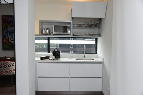 Junior Suite | Private kitchen | Fridge, microwave, espresso maker, cookware/dishes/utensils