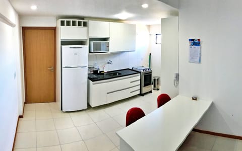 Apartment (1007) | Private kitchen | Full-size fridge, microwave, oven, toaster