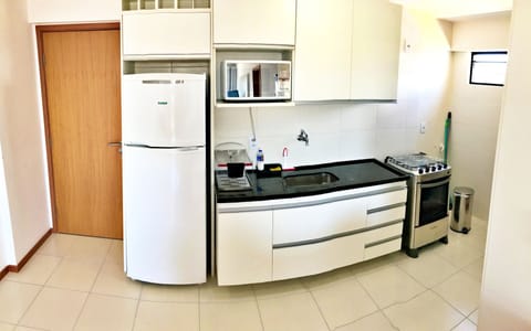 Apartment (1007) | Private kitchen | Full-size fridge, microwave, oven, toaster