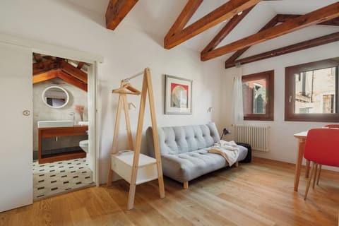 Romantic Studio Suite, 1 Queen Bed with Sofa bed | Living area | 32-inch Smart TV with satellite channels, TV, Netflix