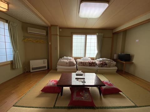 Japanese Style Triple Room with Private Toilet and Shared Bathroom | Free WiFi, bed sheets