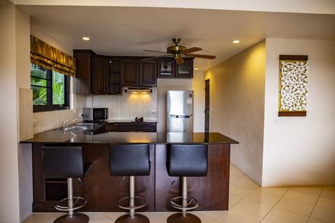 2 Bedrooms Suite | Private kitchen | Full-size fridge, microwave, stovetop, toaster