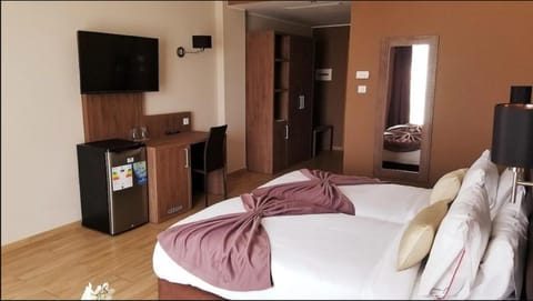 Double or Twin Room | Desk, blackout drapes, free WiFi, bed sheets