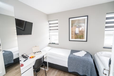 Twin Room, Shared Bathroom | Select Comfort beds, desk, soundproofing, iron/ironing board