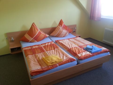 Economy Double Room, Shared Bathroom | Memory foam beds, blackout drapes, cribs/infant beds, rollaway beds