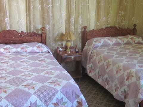 Family Room, 2 Queen Beds | Minibar, iron/ironing board, bed sheets