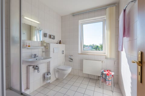 Apartment, 1 Bedroom | Bathroom | Shower, free toiletries, hair dryer, towels