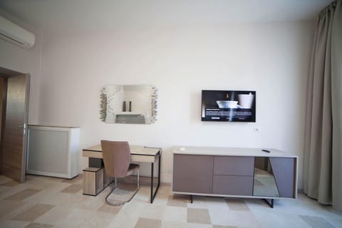 Suite, City View | Individually furnished, desk, laptop workspace, free WiFi