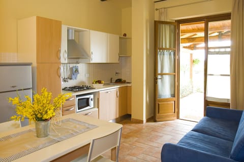 Superior Apartment | Living area | 15-inch plasma TV with satellite channels, TV