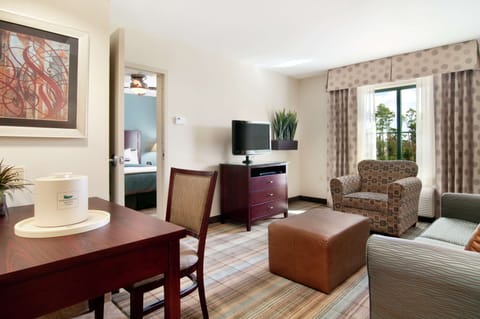 Suite, 1 Bedroom | Living area | Flat-screen TV, DVD player, MP3 dock