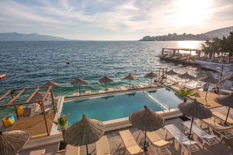 Seasonal outdoor pool, pool umbrellas