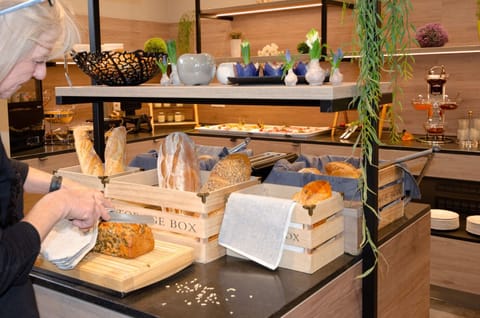 Daily buffet breakfast (EUR 15 per person)