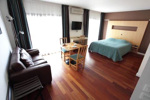 Premium bedding, Select Comfort beds, desk, blackout drapes