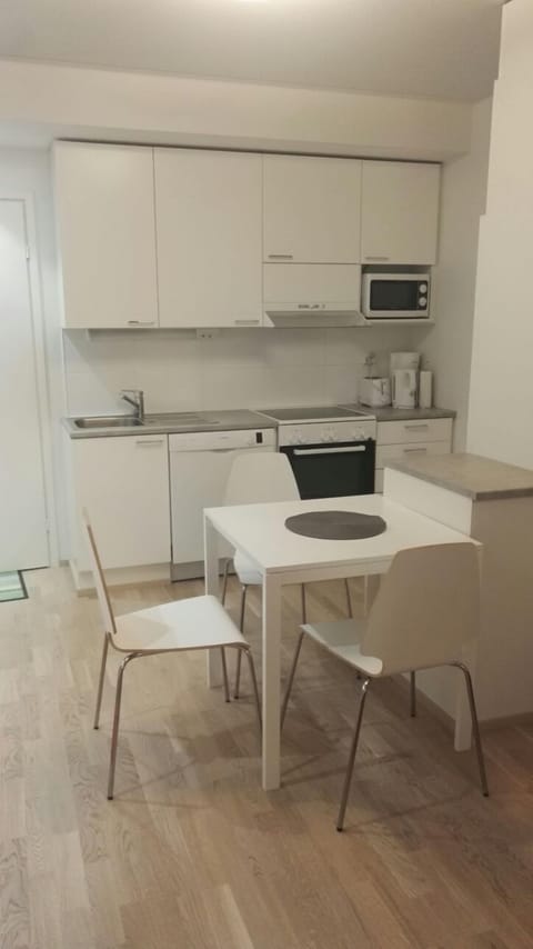 Apartment, Sauna | Private kitchen | Full-size fridge, microwave, oven, stovetop