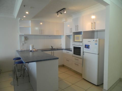 Deluxe Two Bedroom Apartment - Absolute Beach Front | Private kitchen | Full-size fridge, microwave, oven, stovetop