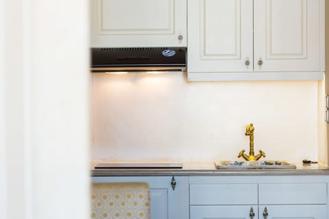 Suite, Balcony, Pool View | Private kitchenette | Fridge, oven, stovetop, coffee/tea maker